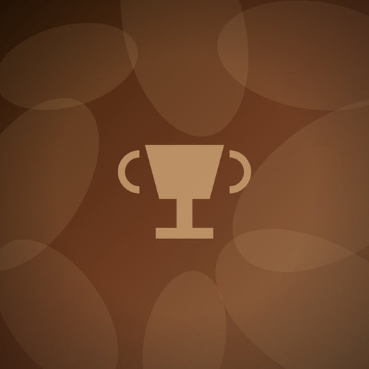How do event planners choose between different award materials (wood, crystal, glass)?