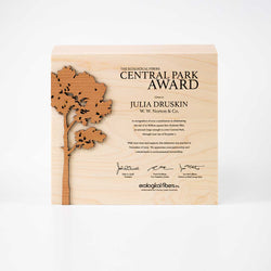 Sustainable trophies and awards handcrafted from reclaimed wood and recycled glass, featuring custom laser engraving for eco-conscious corporate recognition. Made in Vancouver, BC.