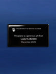 Engraved black glass plaque with silver colourfill